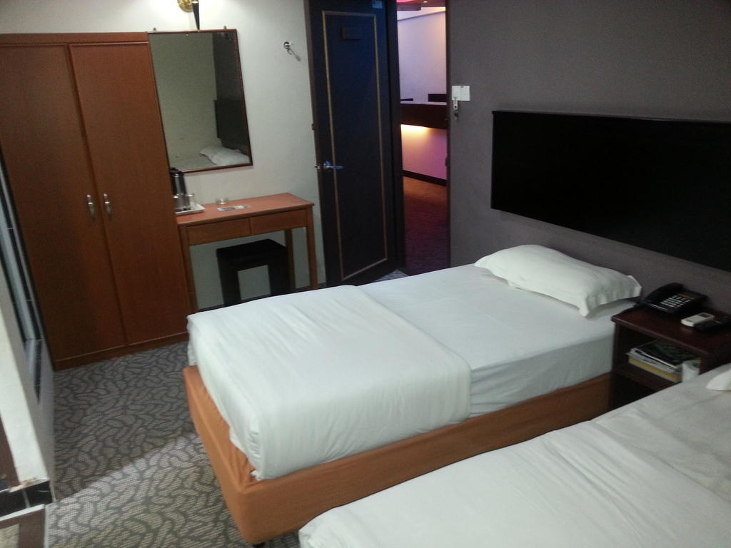 Oriental Inn Kuching Rom bilde